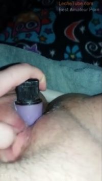 Using a purple dildo for strong masturbation