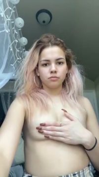 Cute blonde teasing in a miniskirt